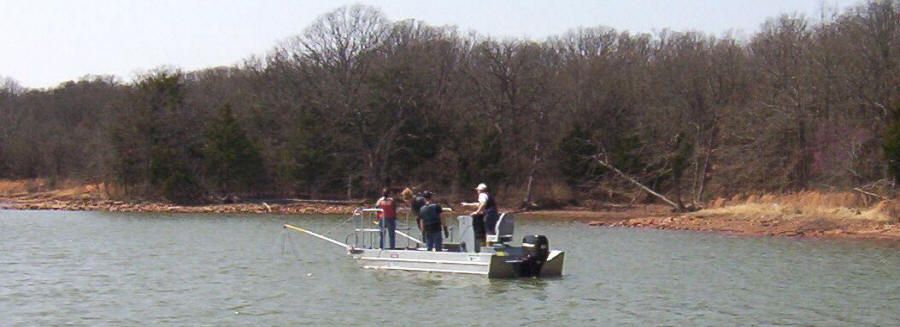 Electrofishing boat being used to teach students about fisheries management techniques
